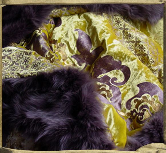 Throw in chinese yellow Velasquez velvet, SANG SACRE center and QUATRRO FOGLIE border backed in fox fur.
